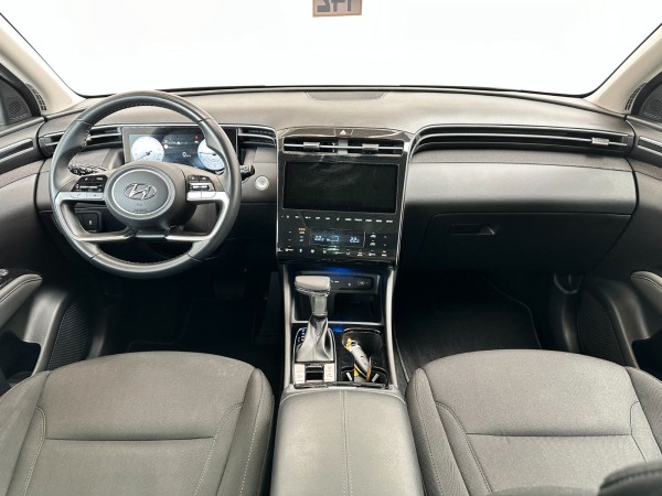 Buy Hyundai TUCSON Hybrid 48V*Kamera*Klima*Scheckheft*1.Hand Lithuania | img №11 | Unis.lt